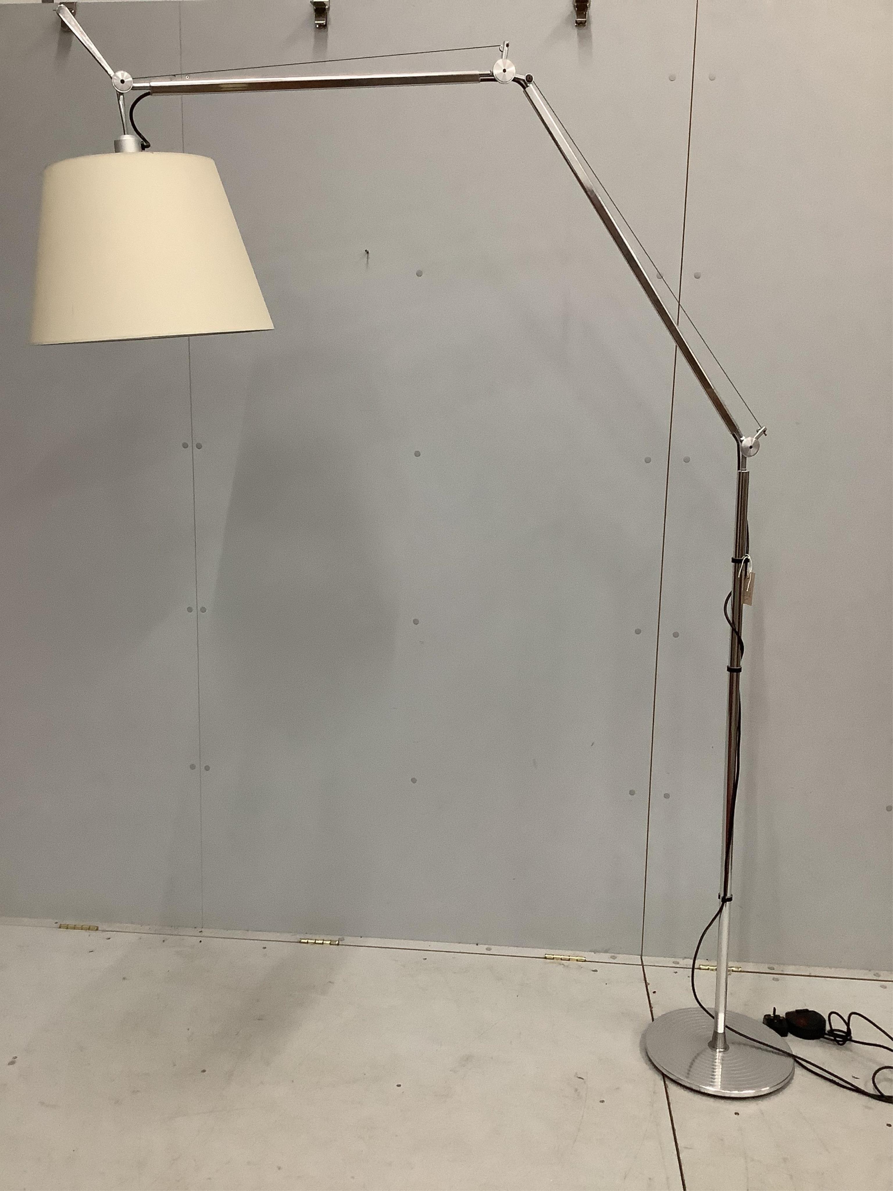 A Contemporary Artemide Tolomeo chrome adjustable floor lamp by Michele de Lucchi. Condition - good